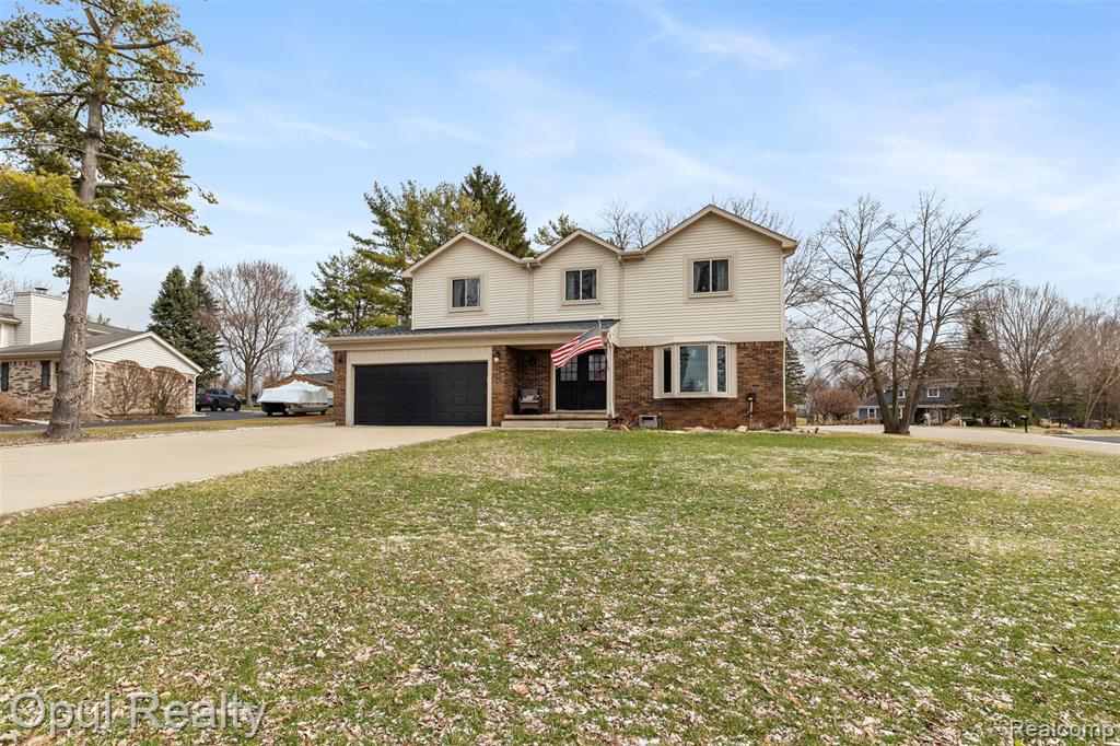 4748 Ravinewood Drive, Commerce Twp, MI 48382 — Photo 2