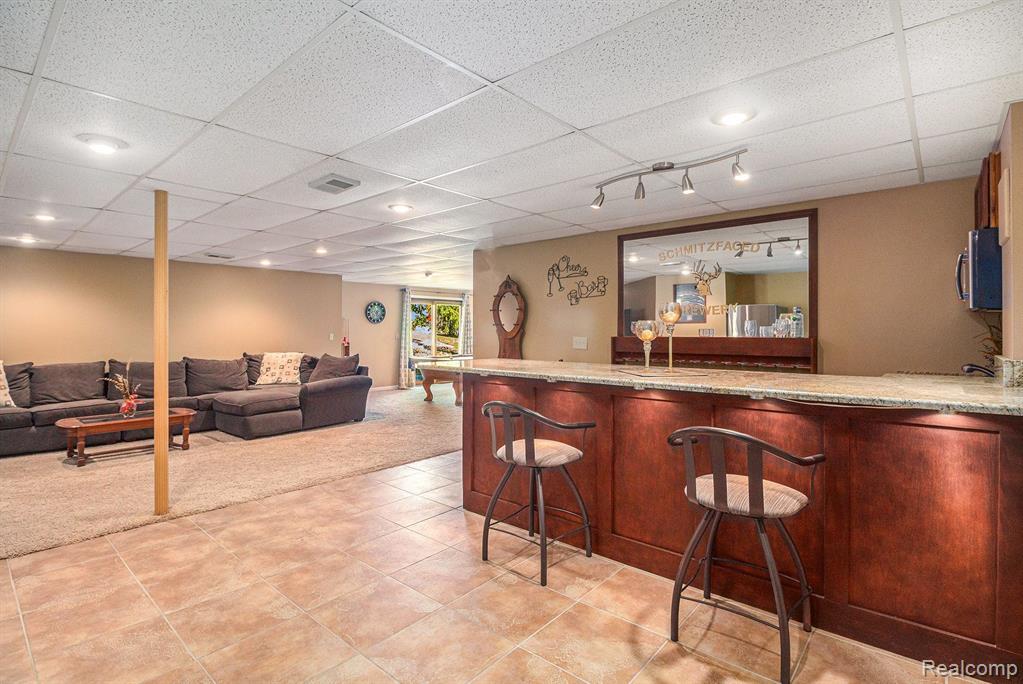 57598 HIDDEN TIMBERS Drive, South Lyon, MI 48178 — Photo 25