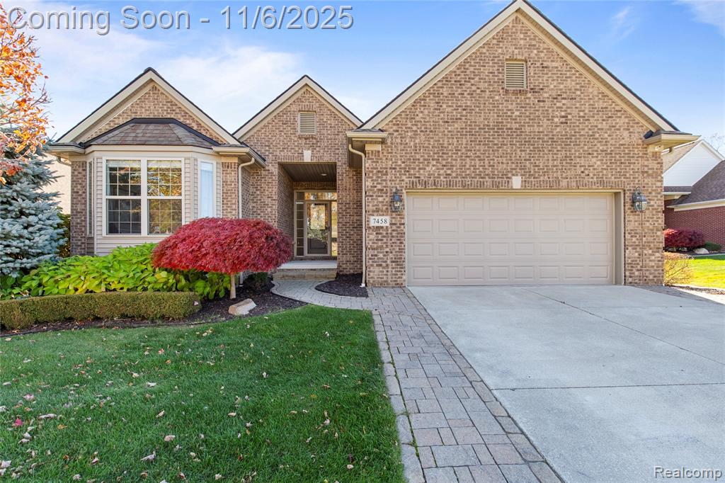 7458 Augusta Drive, 824, Washington, MI — front exterior