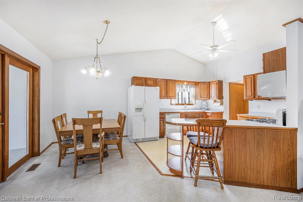 Dining area open to 3 Season Sunroom