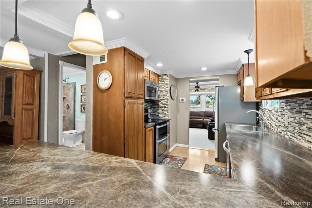 265 Oak Island Drive, Wolverine Lake, MI 48390 — Photo 9