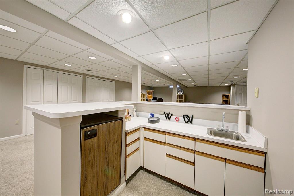 9329 EASTWIND Drive, Livonia, MI 48150 — Photo 37