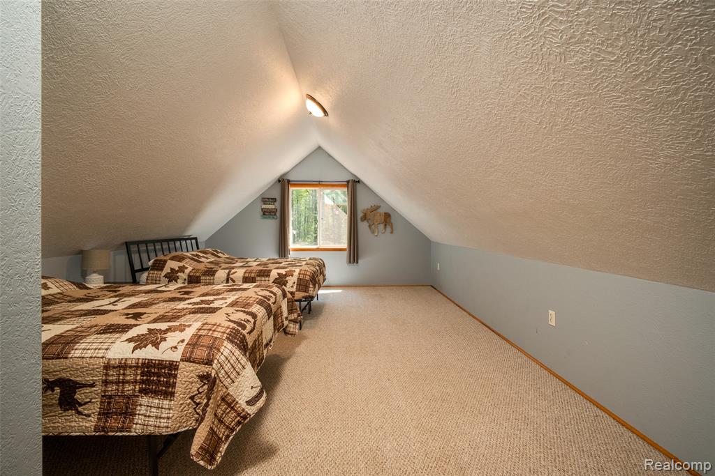 6954 AARWOOD Trail NW, Rapid City, MI 49676 — Photo 34