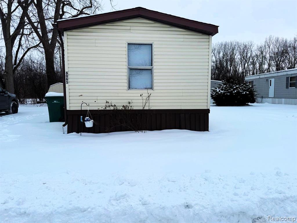 6065 Vernon, Belleville, MI 48111 — front exterior
