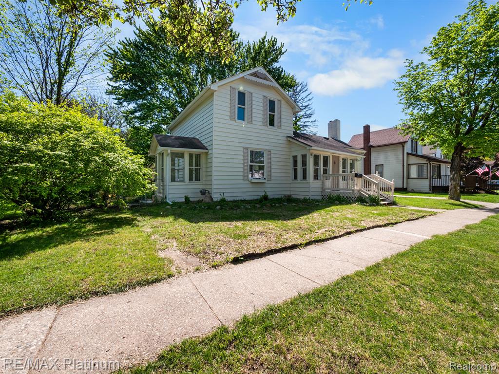 415 E SIBLEY Street, Howell, MI 48843 — front exterior
