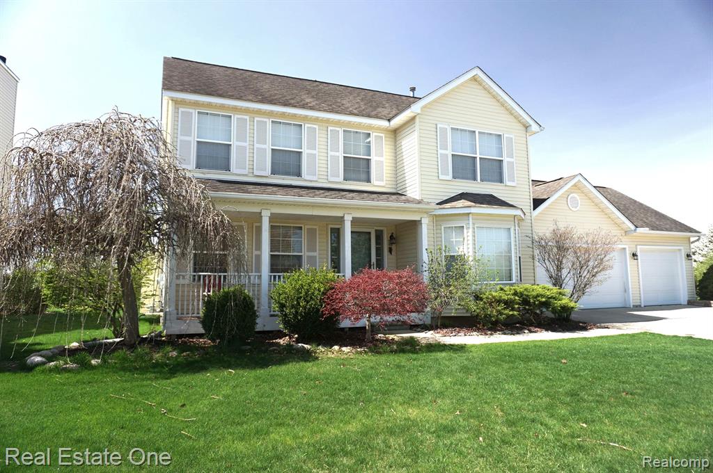 6993 WELLINGTON Drive, Dexter, MI 48130 — front exterior