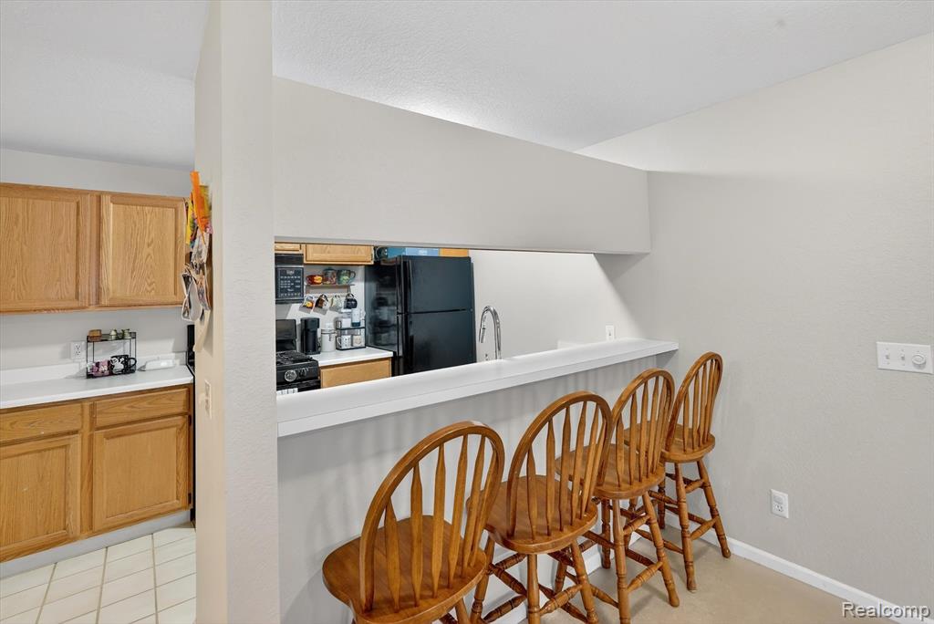613 Curzon Court, 203, Howell, MI 48843 — Photo 13
