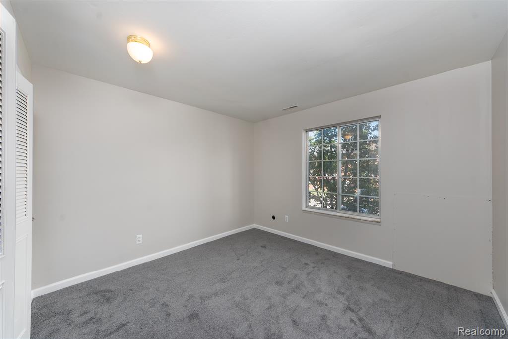 505 W Highland Road, Howell, MI 48843 — Photo 12