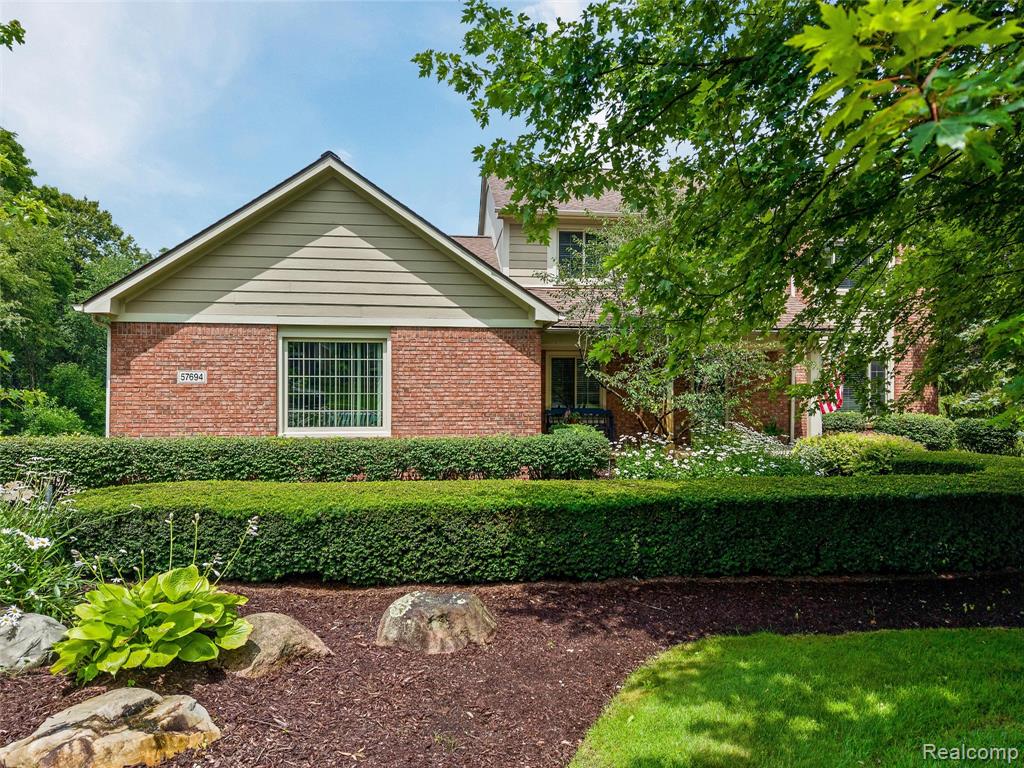 57694 Hidden Timbers Drive, South Lyon, MI 48178 — front exterior