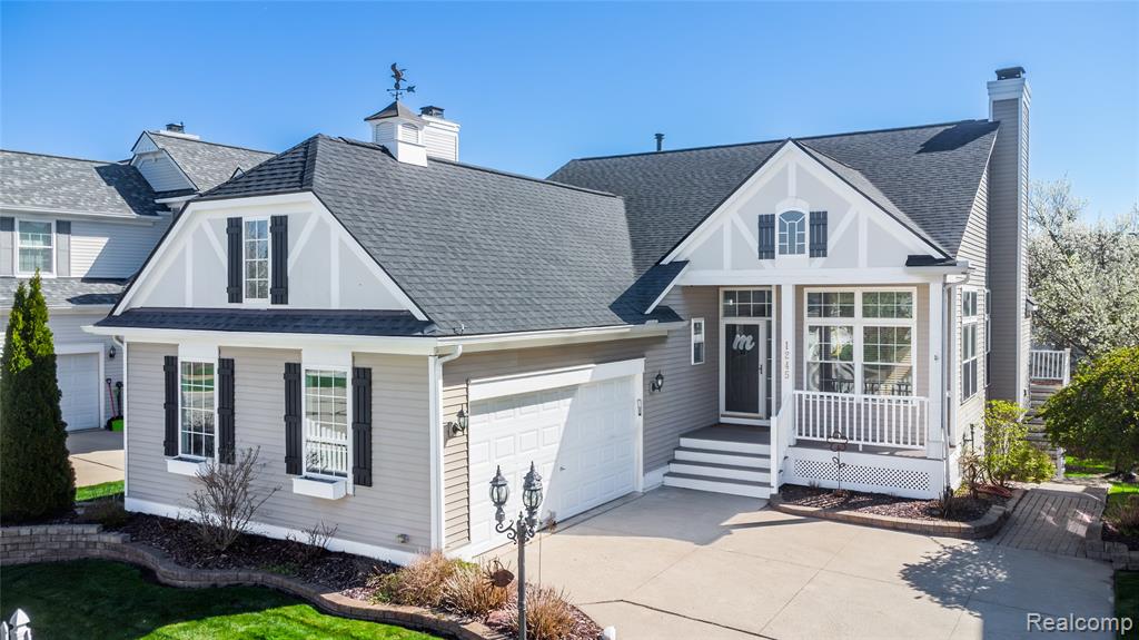 1245 Portsmouth Drive, Howell, MI 48843 — front exterior