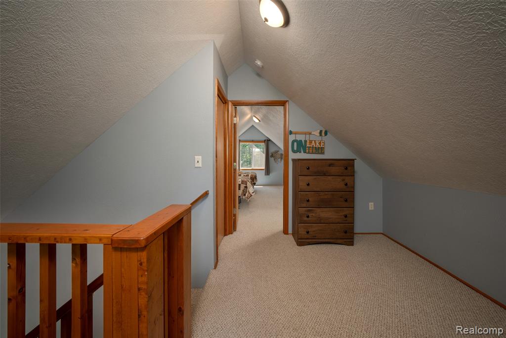 6954 AARWOOD Trail NW, Rapid City, MI 49676 — Photo 33