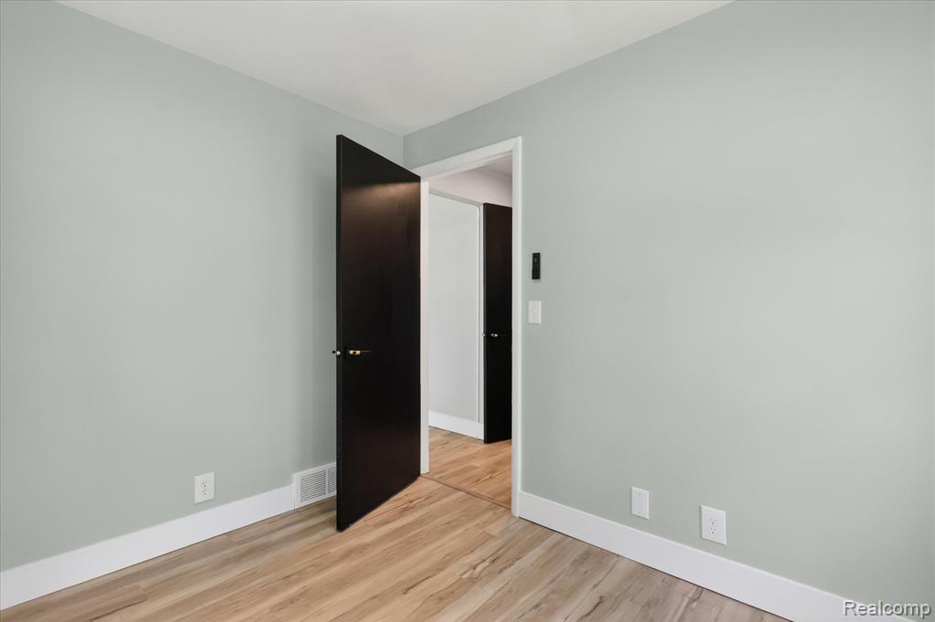 677 Lucille Drive, Wolverine Lake, MI 48390 — Photo 24