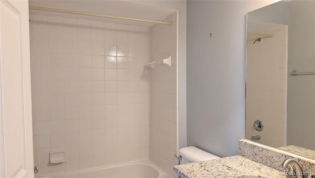 413 VILLAGE Drive, Walled Lake, MI 48390 — Photo 14