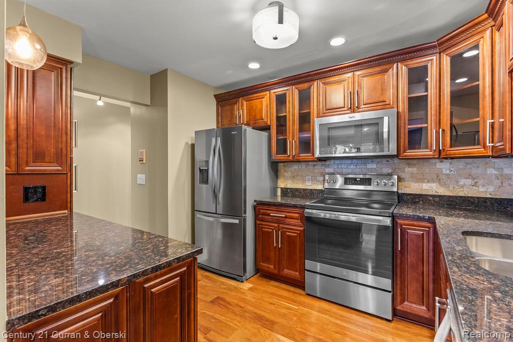 11865 SYCAMORE Drive, 31, Plymouth, MI 48170 — Photo 14