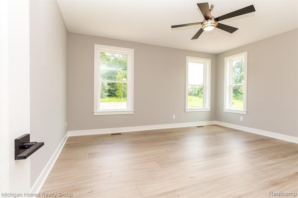 2910 LOON Drive, Wixom, MI 48393 — Photo 39
