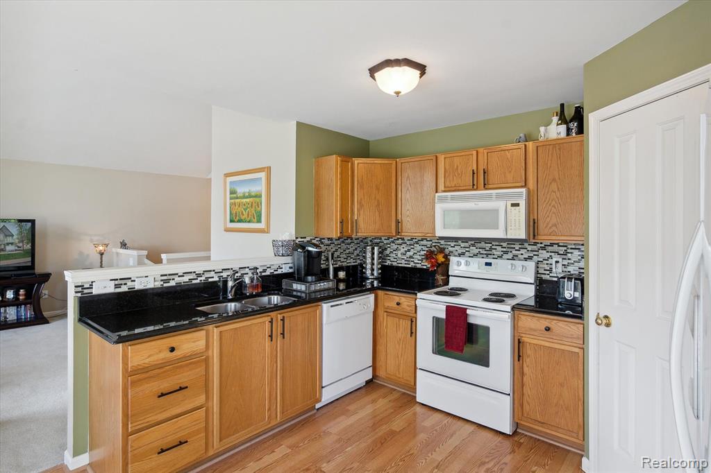 4428 ASTER Boulevard, Howell, MI 48843 — Photo 11