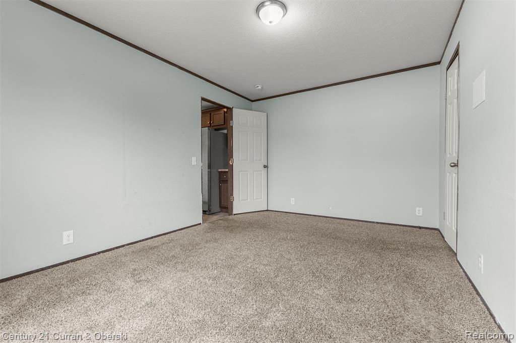 76 Fawn Lake Drive, Walled Lake, MI 48390 — Photo 19