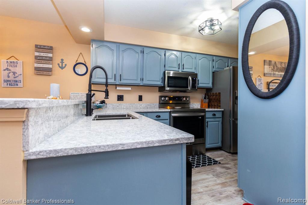 271 Chrysler Road, Unit 19, Oscoda, MI 48750 — Photo 16