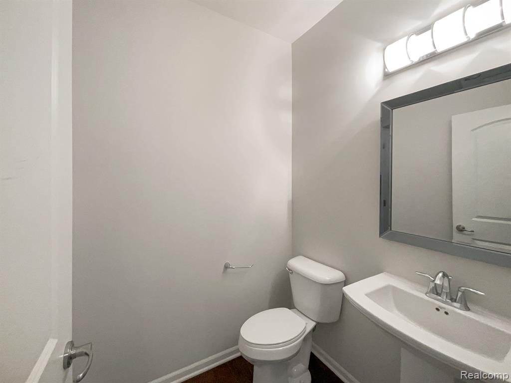 242 CENTER Boulevard, Wixom, MI 48393 — Photo 19