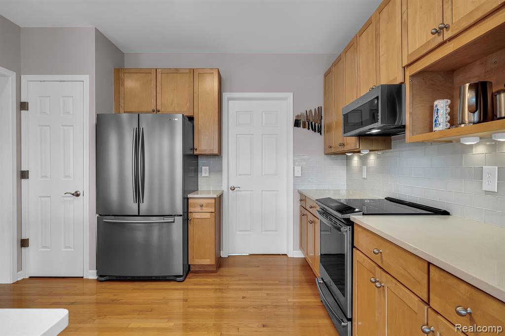 620 FAIRWAYS Lane, Chelsea, MI 48118 — Photo 10