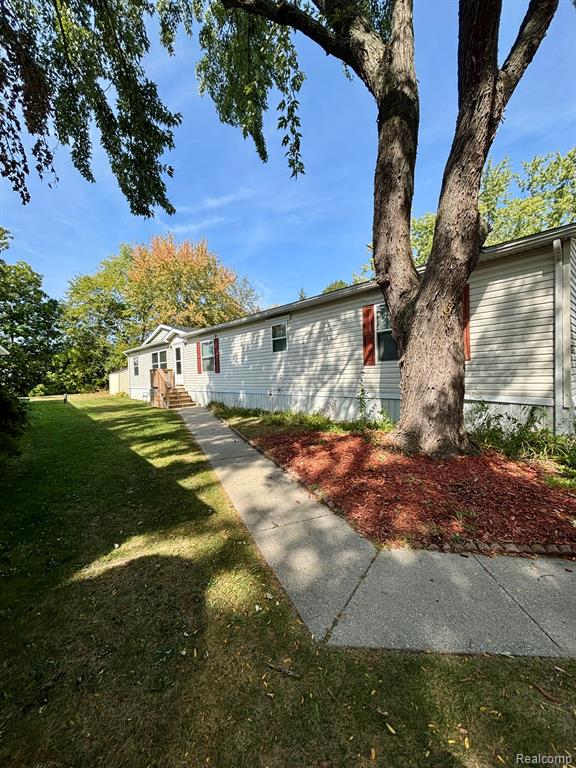 4041 #176 Grange Hall Road, Holly, MI 48442 — Photo 2