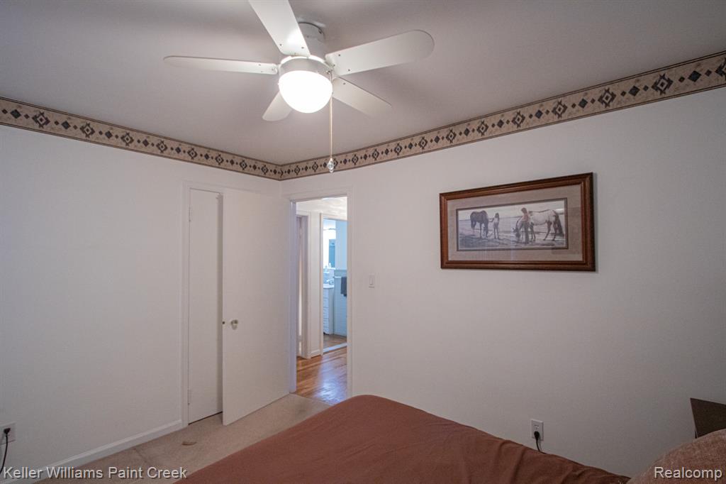 Unfurnished bedroom featuring a ceiling fan