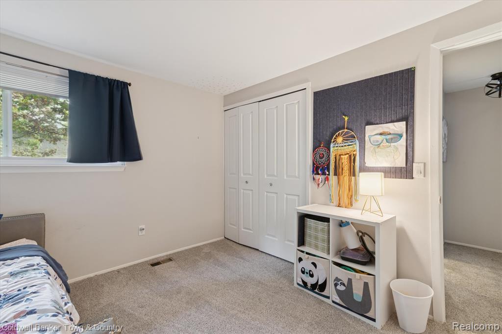 616 Rickett Road, 124, Brighton, MI 48116 — Photo 18