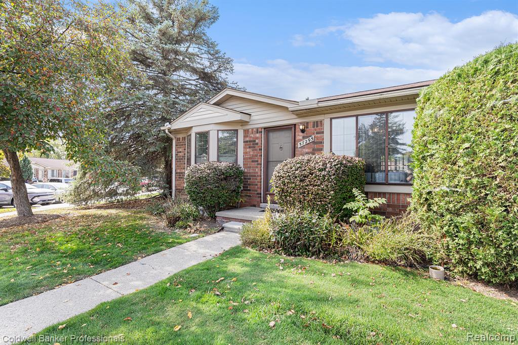 57295 Beaconsfield Road, Washington, MI — front exterior