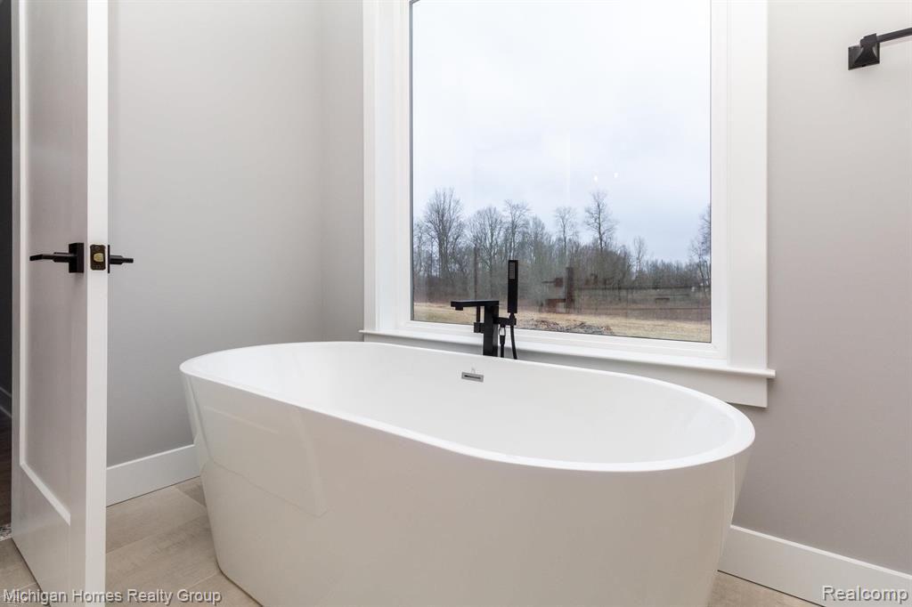 2910 LOON Drive, Wixom, MI 48393 — Photo 56