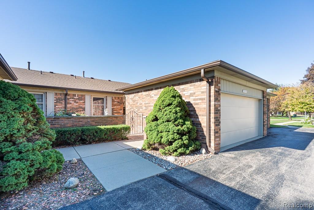 49414 Richmond Court, Shelby Twp, MI 48315 — front exterior