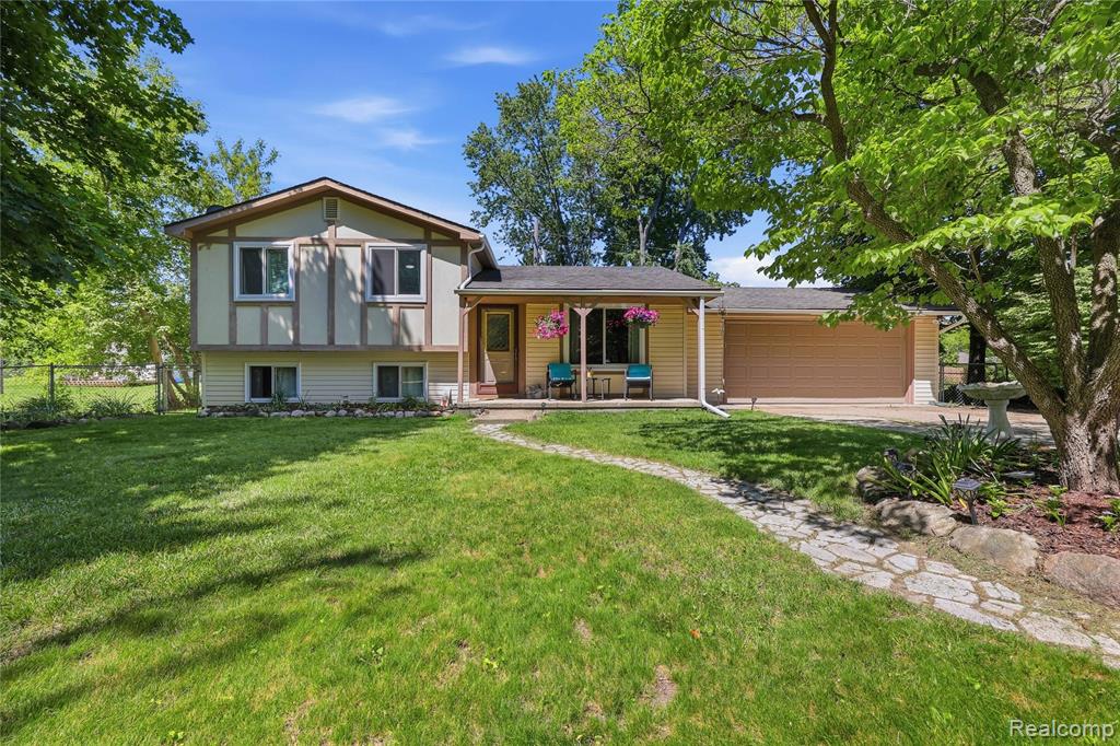 5069 Warmbriar Drive, White Lake, MI 48383 — front exterior