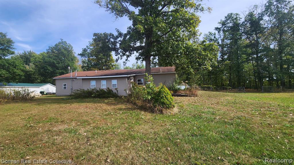 4865 S STEEL Road, Merrill, MI 48637 — front exterior