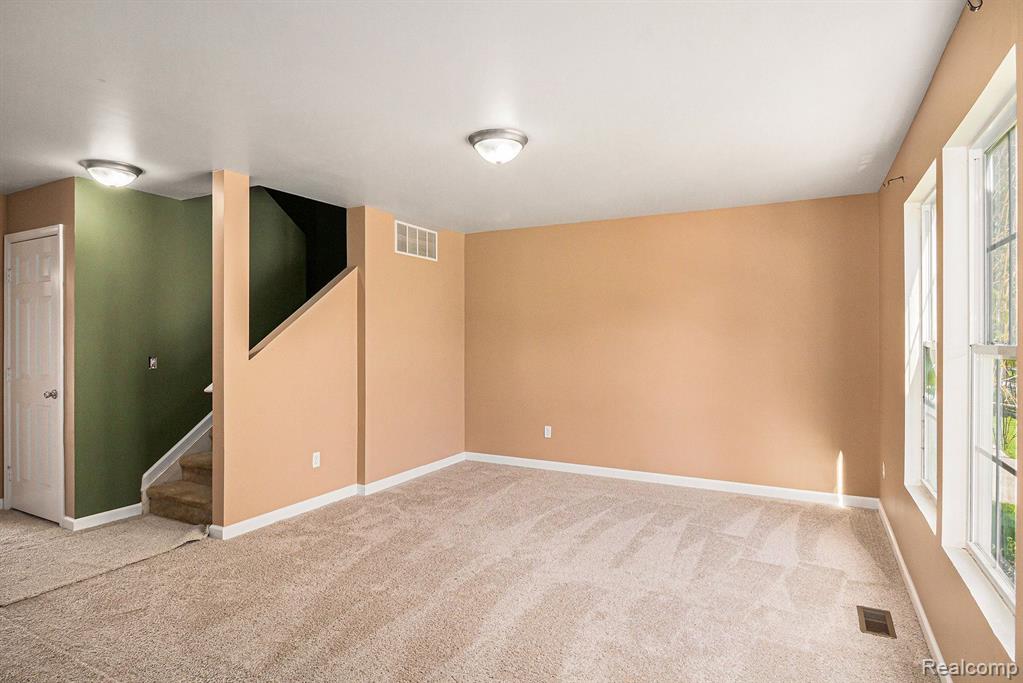 8608 RIFLE RIVER Drive, Fowlerville, MI 48836 — Photo 2