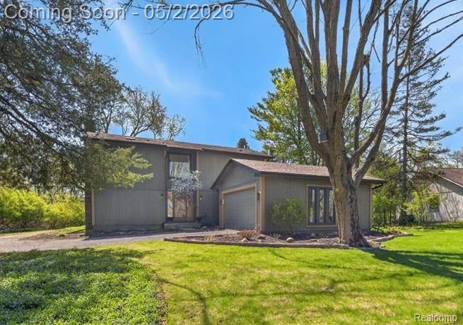 7025 Cedarbank Drive, West Bloomfield, MI 48324 — front exterior