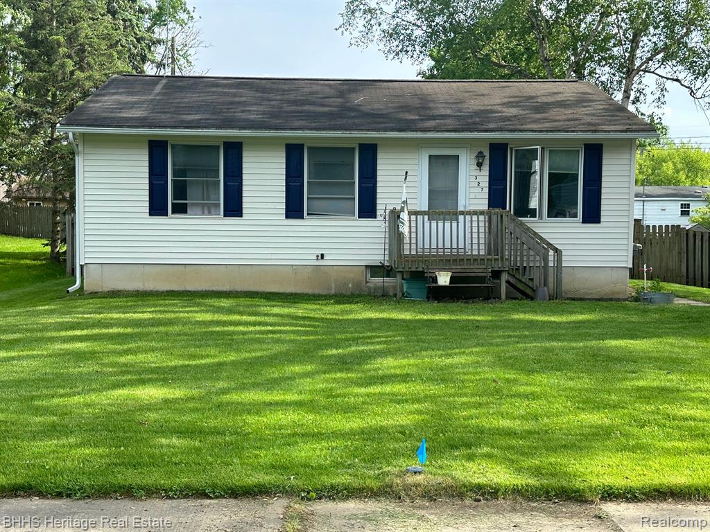 327 CHESTNUT Street, Webberville, MI 48892 — front exterior