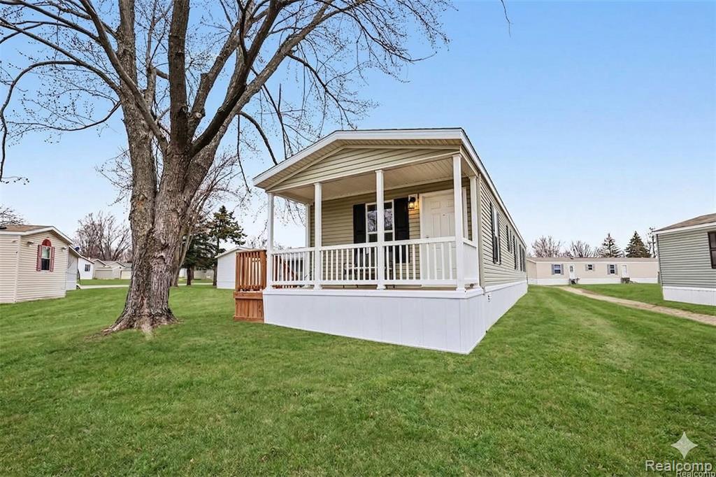 49611 Au Lac Dr E, Chesterfield, MI — front exterior