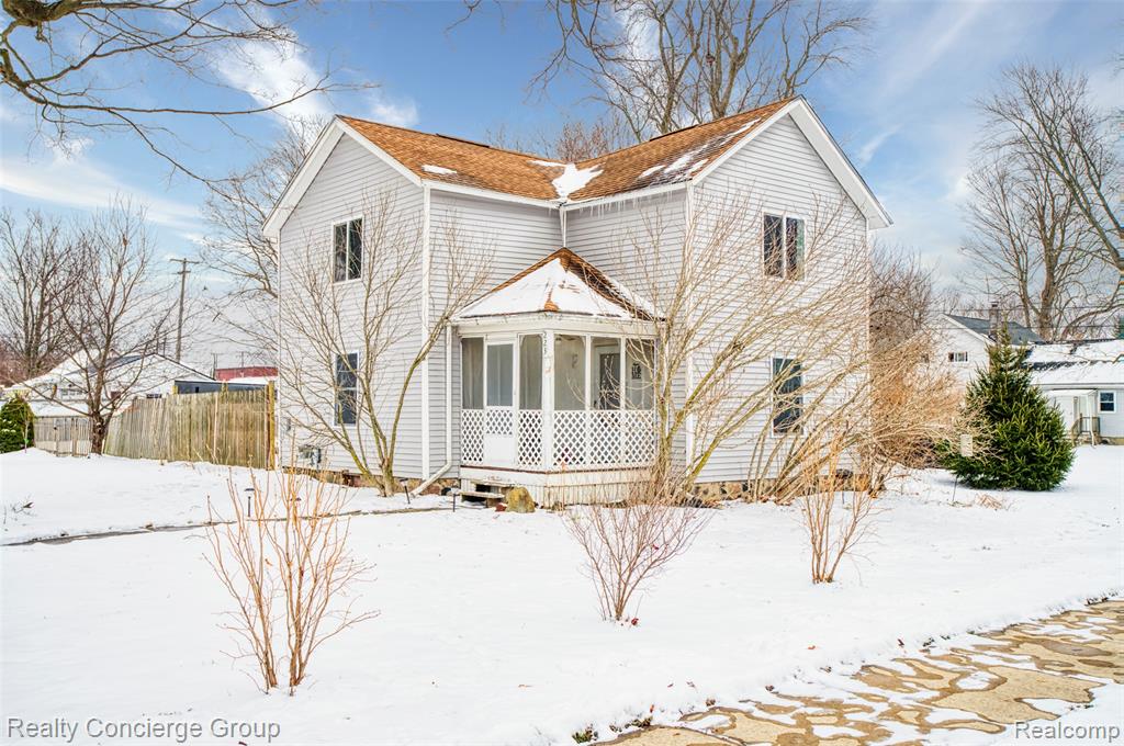 223 S Summit Street, Webberville, MI 48892 — front exterior