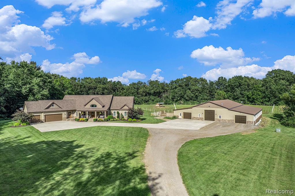 7196 MANOR Lane, Fowlerville, MI 48836 — Photo 2