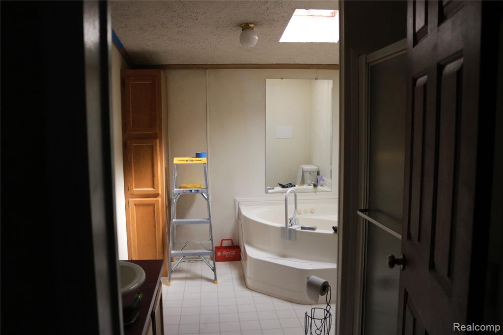 311 Peach Blossom Ct, Otisville, MI 48463 — Photo 12