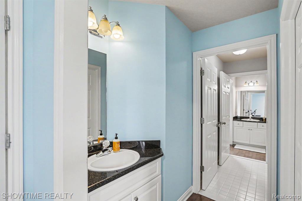 54676 Woodcreek Boulevard, Utica, MI 48315 — Photo 28