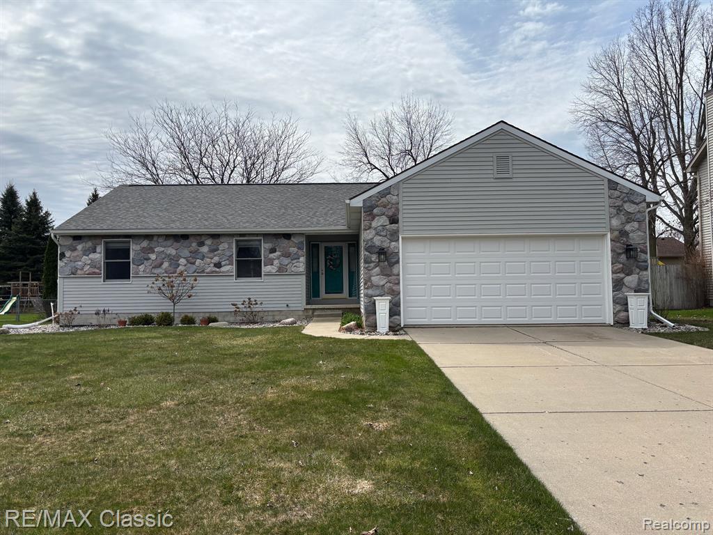 5855 Caleta Drive, Lansing, MI 48911 — front exterior
