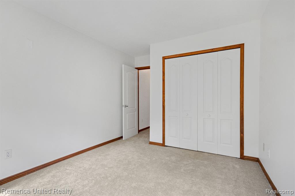 2781 HONEY SUCKLE Court, Wixom, MI 48393 — Photo 21