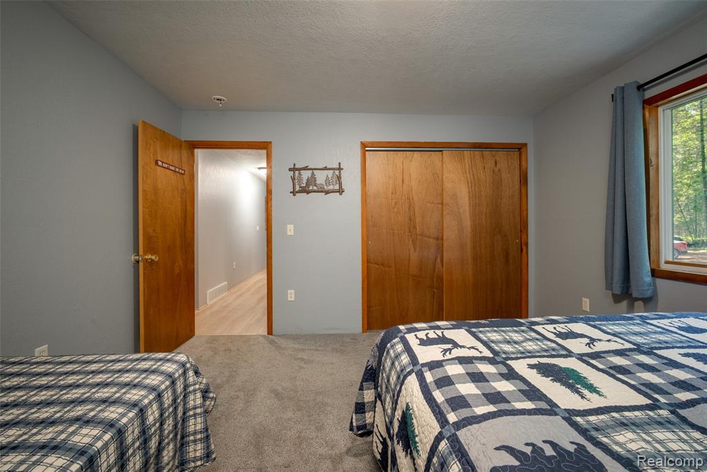 6954 AARWOOD Trail NW, Rapid City, MI 49676 — Photo 24