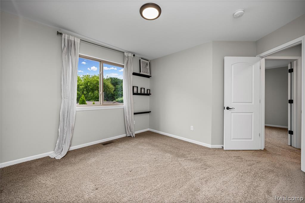 730 Leon Road, Walled Lake, MI 48390 — Photo 38