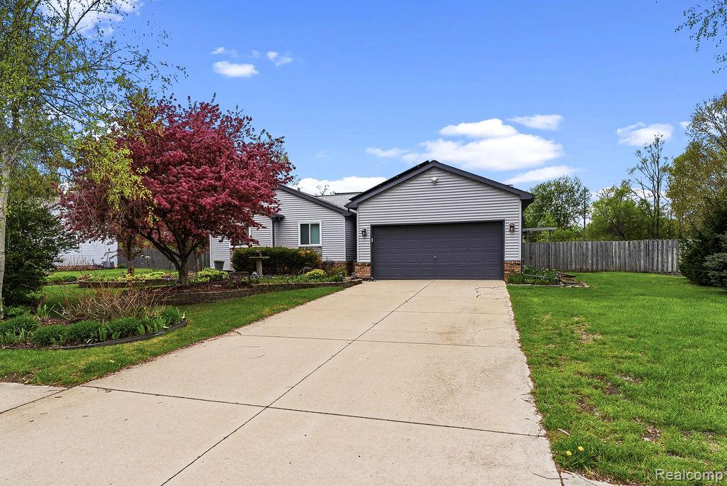 4713 Desert Bridge Court, Highland, MI 48356 — Photo 3