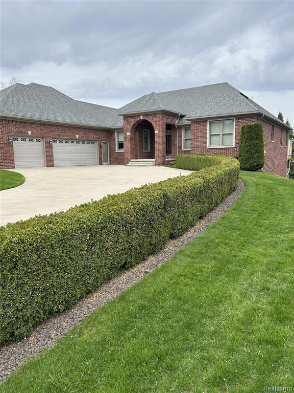 58548 Cory Lake Drive, Washington, MI — front exterior