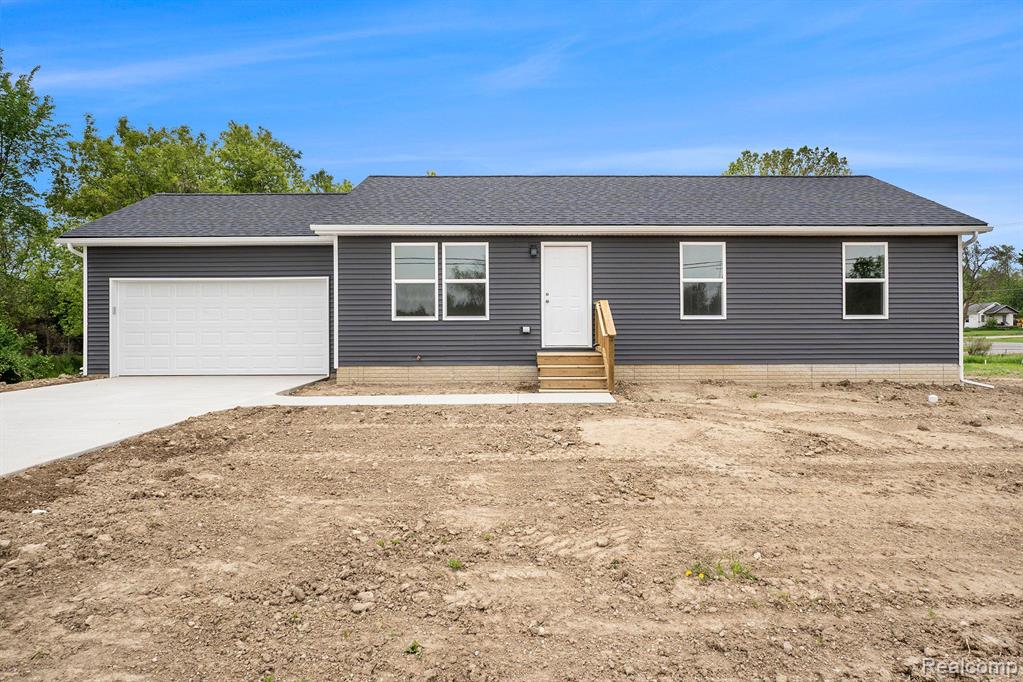 5499 SITKA Street, Burton, MI 48519 — front exterior
