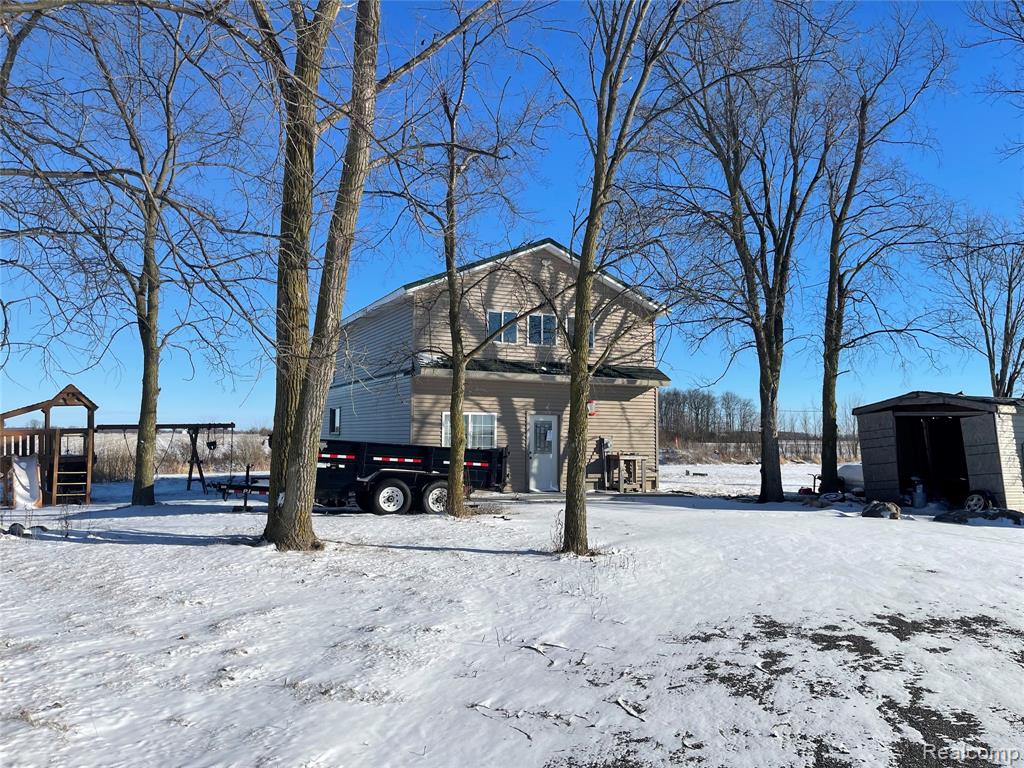 8701 County Line Road, Milan, MI 48160 — front exterior