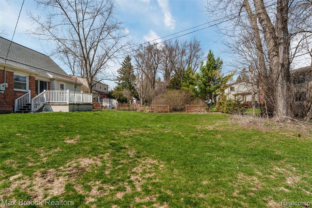 View of yard with a deck