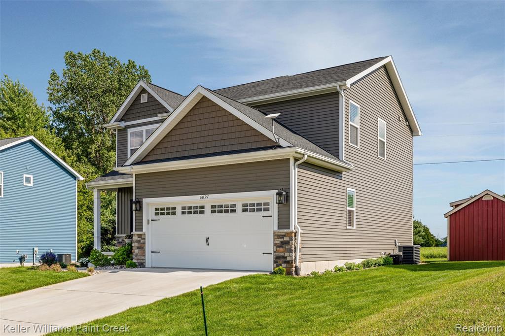 6097 Summerbrooke Circle, Fowlerville, MI 48836 — Photo 37